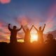 Happy family in sunset