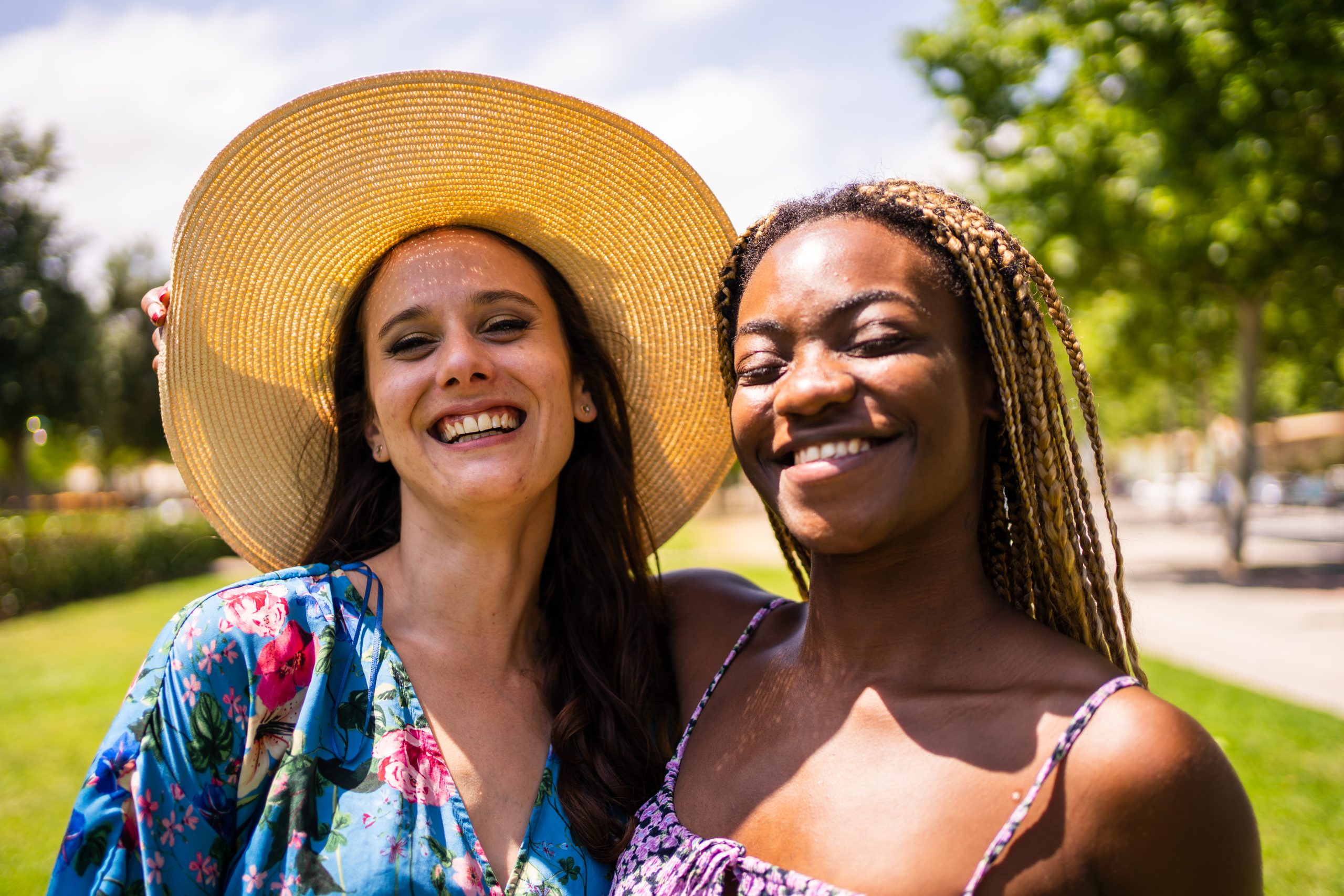 portrait of two multiethnic friends smiling to the 2025 01 08 03 39 59 utc scaled